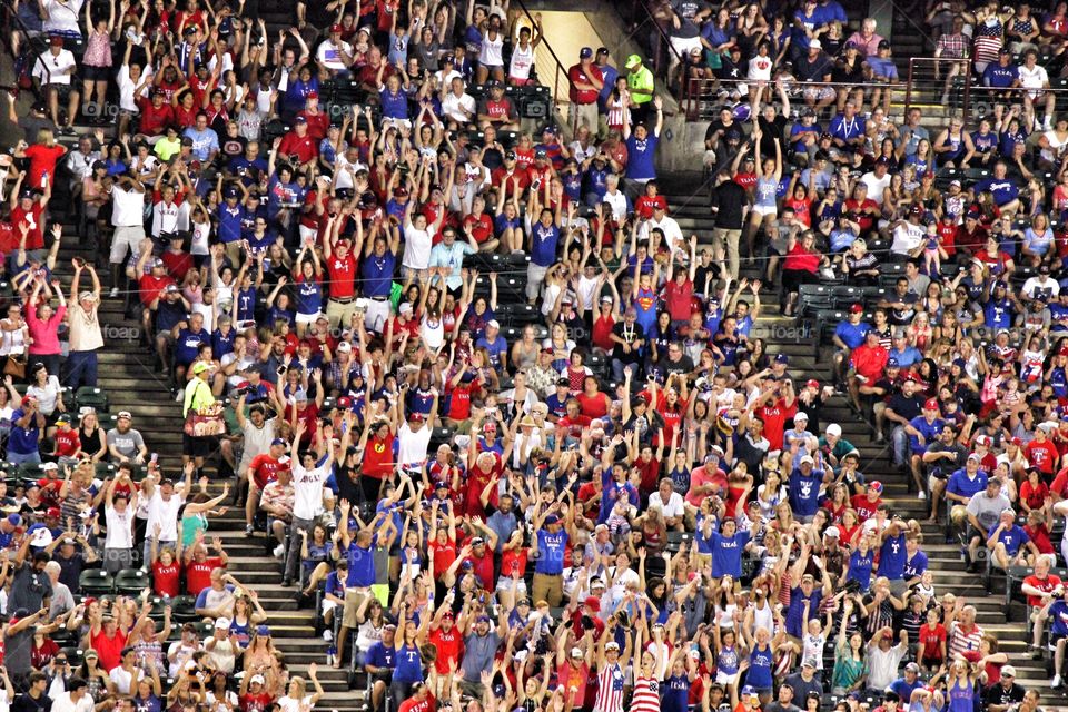 Wave through the crowd. Crowd doing the wave at a Texas Rangers baseball game