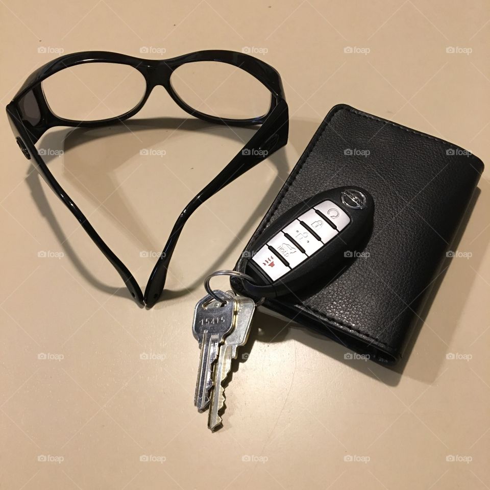 Black Eyeglasses, Black Wallet, Car & House Keys

Now I'm ready to leave, everything I need is on the table so I can grab & go!