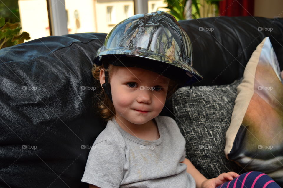 Child in a unique helmet