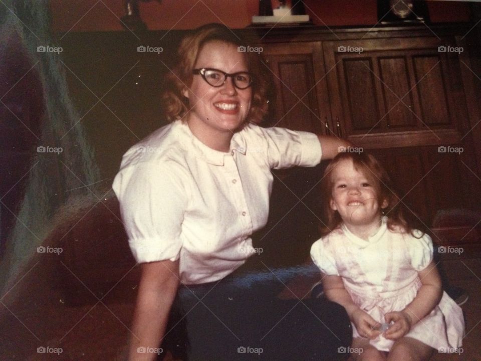 Vintage mother and daughter. Happy girl