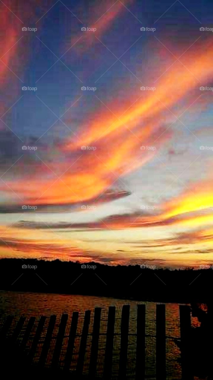 sunrises sunsets foap mission soaring clouds into the sunset over salt marsh