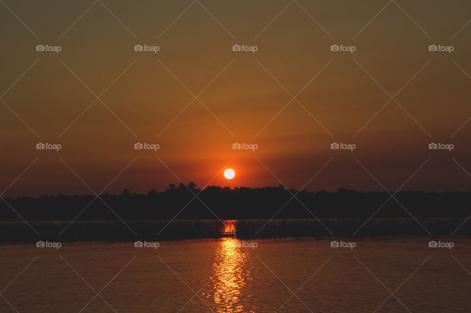 Sunset on prairie lake 