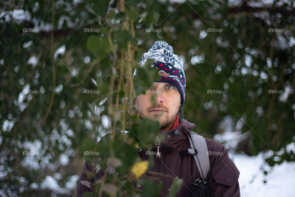 portrait of man against forest