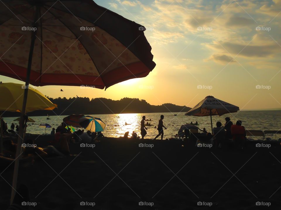 Enjoying the the sun . Enjoying the last minutes of the sunlight at the beach 
