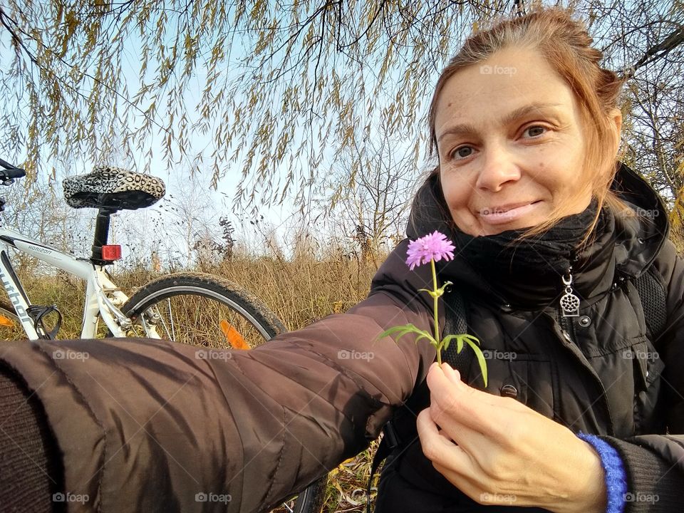 selfie girl on the nature with flower autumn time