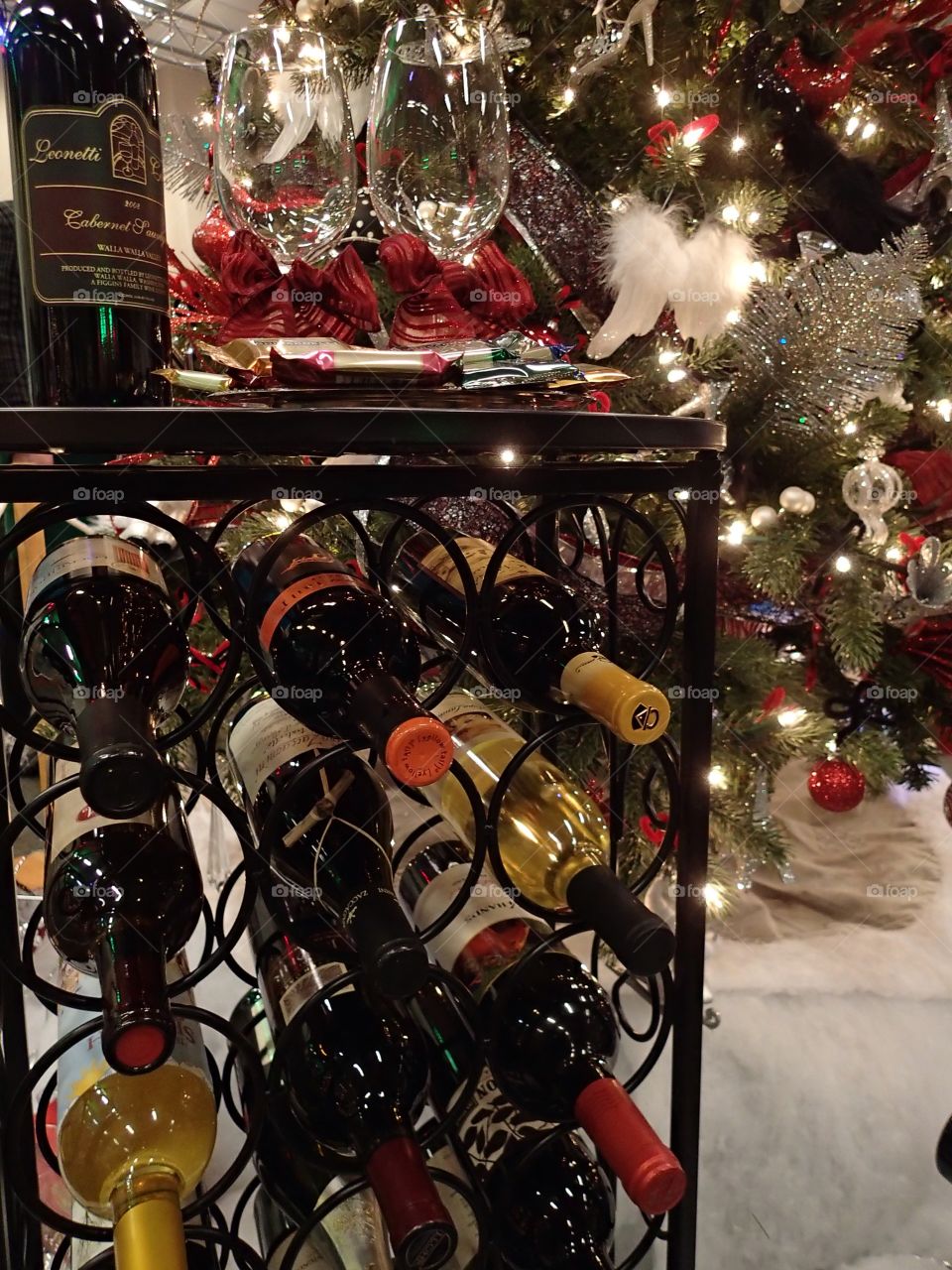 A rack of wine as part of a Christmas display at the annual Central Oregon Festival of Trees fundraising event during the holiday season.