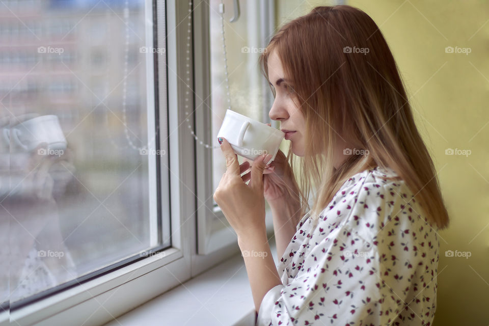 girl is drinking coffee