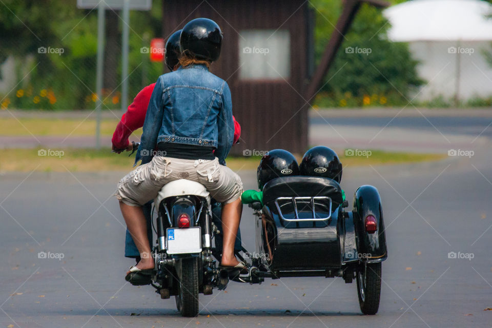 Family trip on motorcycle with sidecar