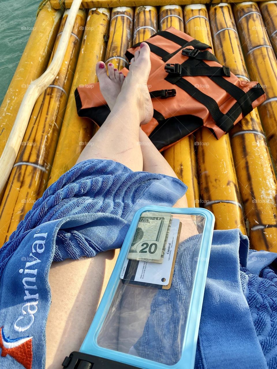 Sitting on a raft in a river
