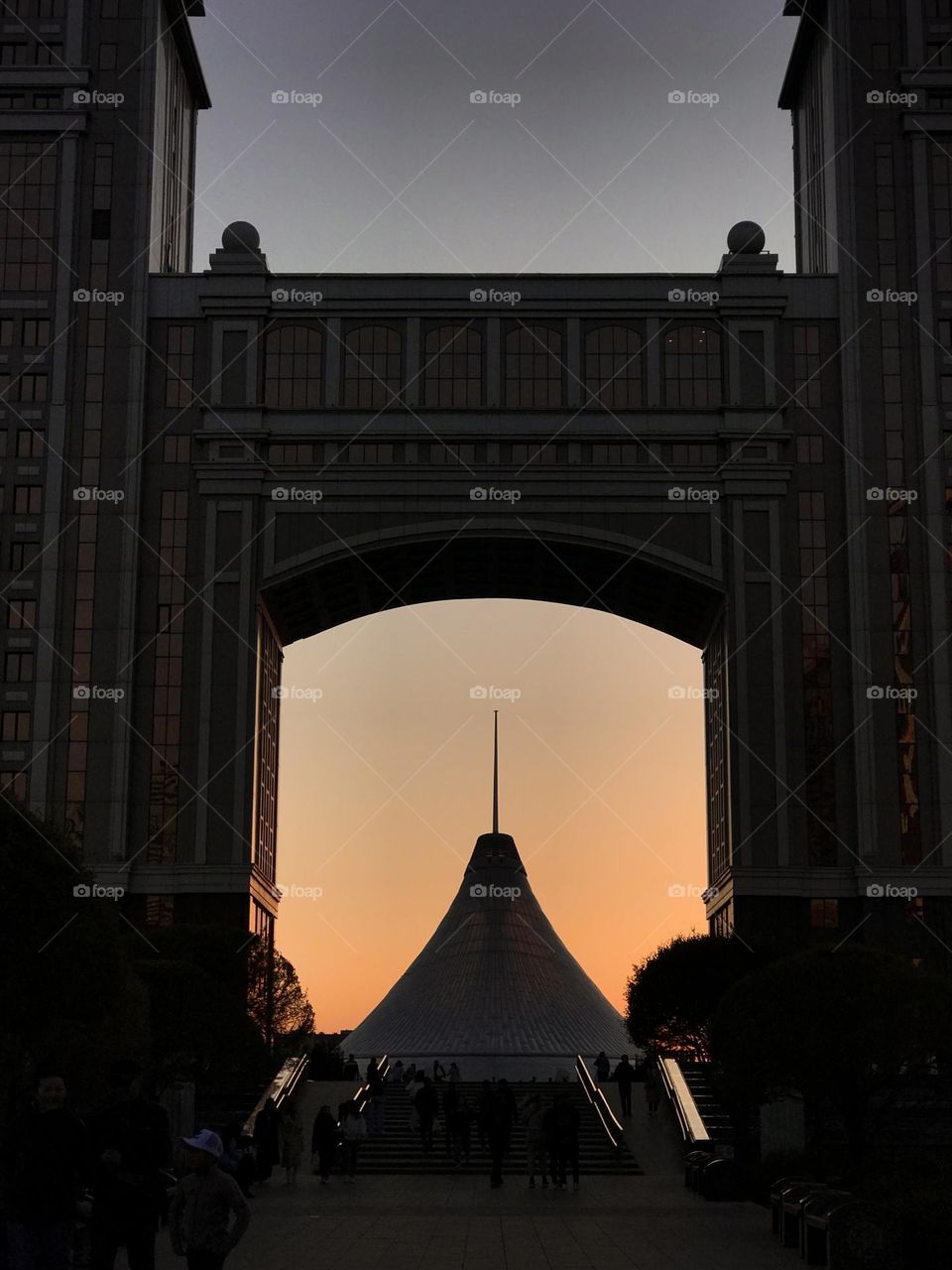 Shopping mall in a shape of a triangle during the sunset 