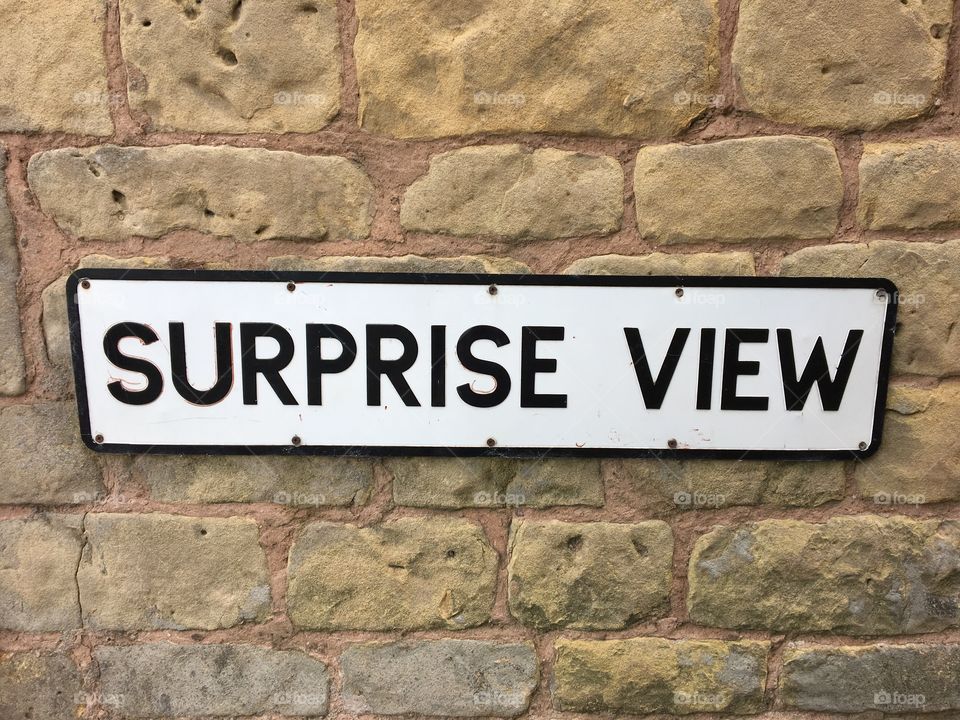 Alleyway called Surprise View ... at the end is a panoramic view of Derbyshire countryside .. 
