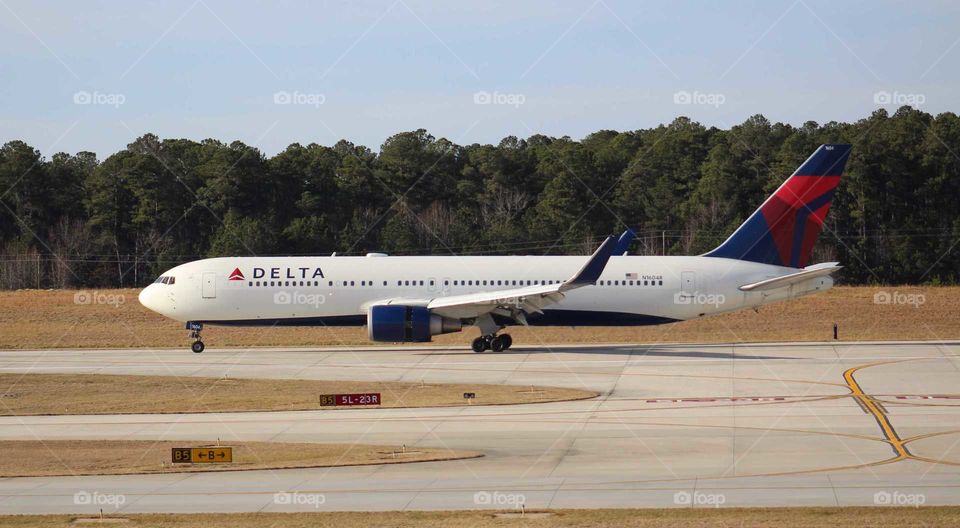 A Delta Boeing 767 landing at Raleigh Durham International Airport after its voyage from Paris.