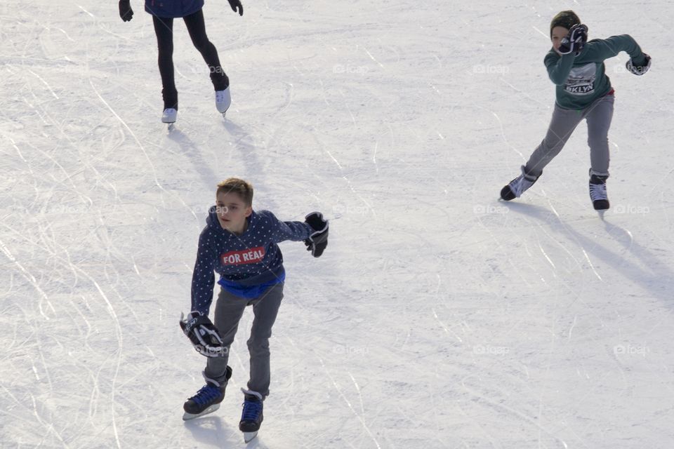 Young boys on ice rink 