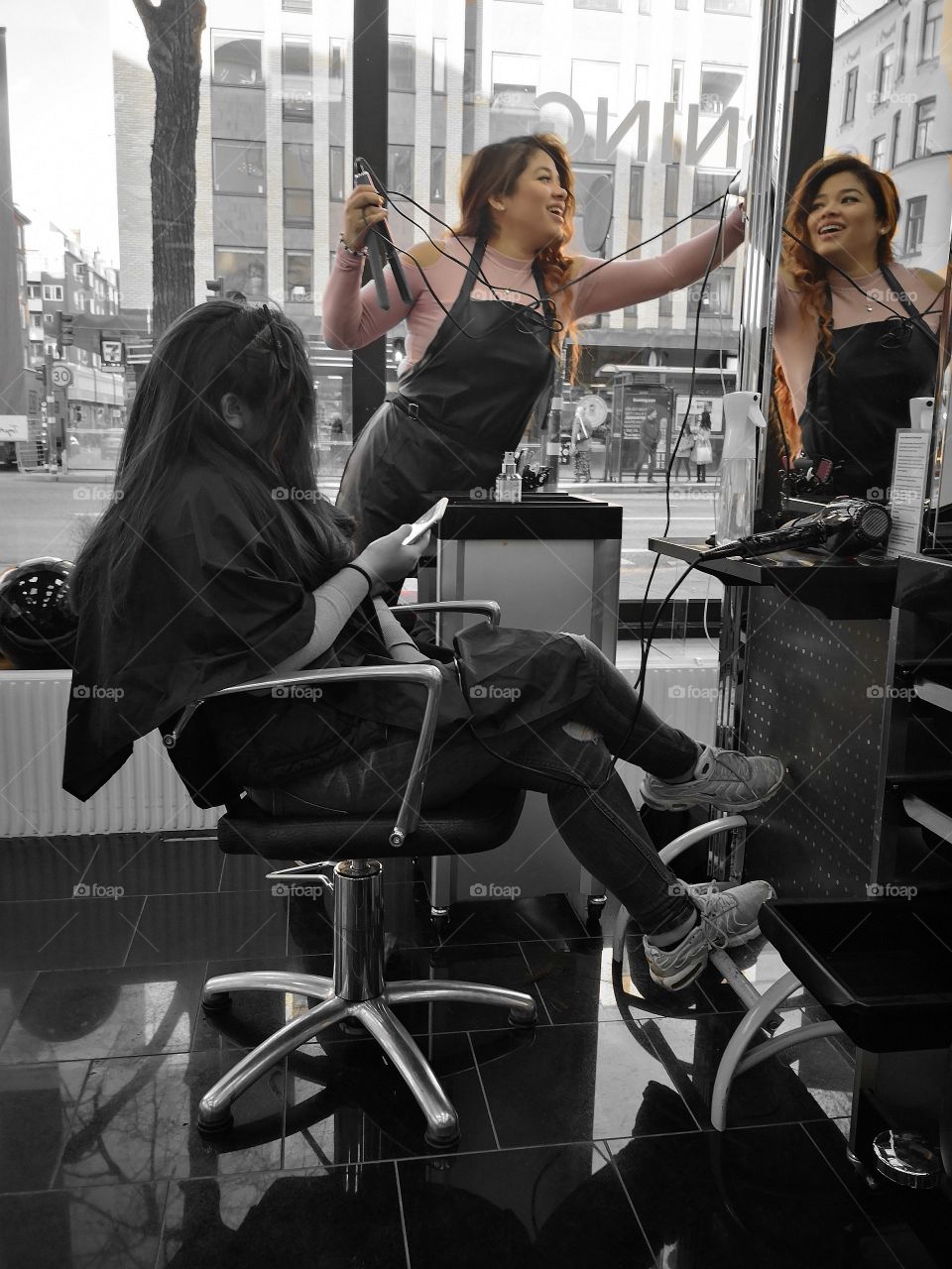 Busy girls in a hair salon.