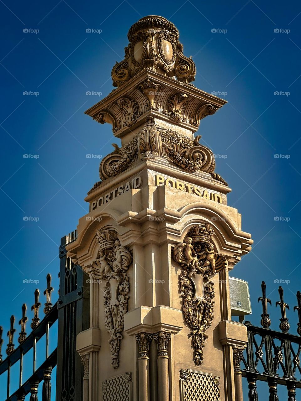 An ornamental column in a fence on the Suez Canal at Port Said.