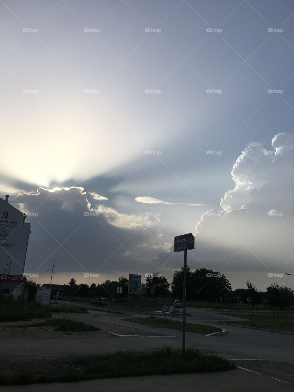 The sun is playing with the clouds