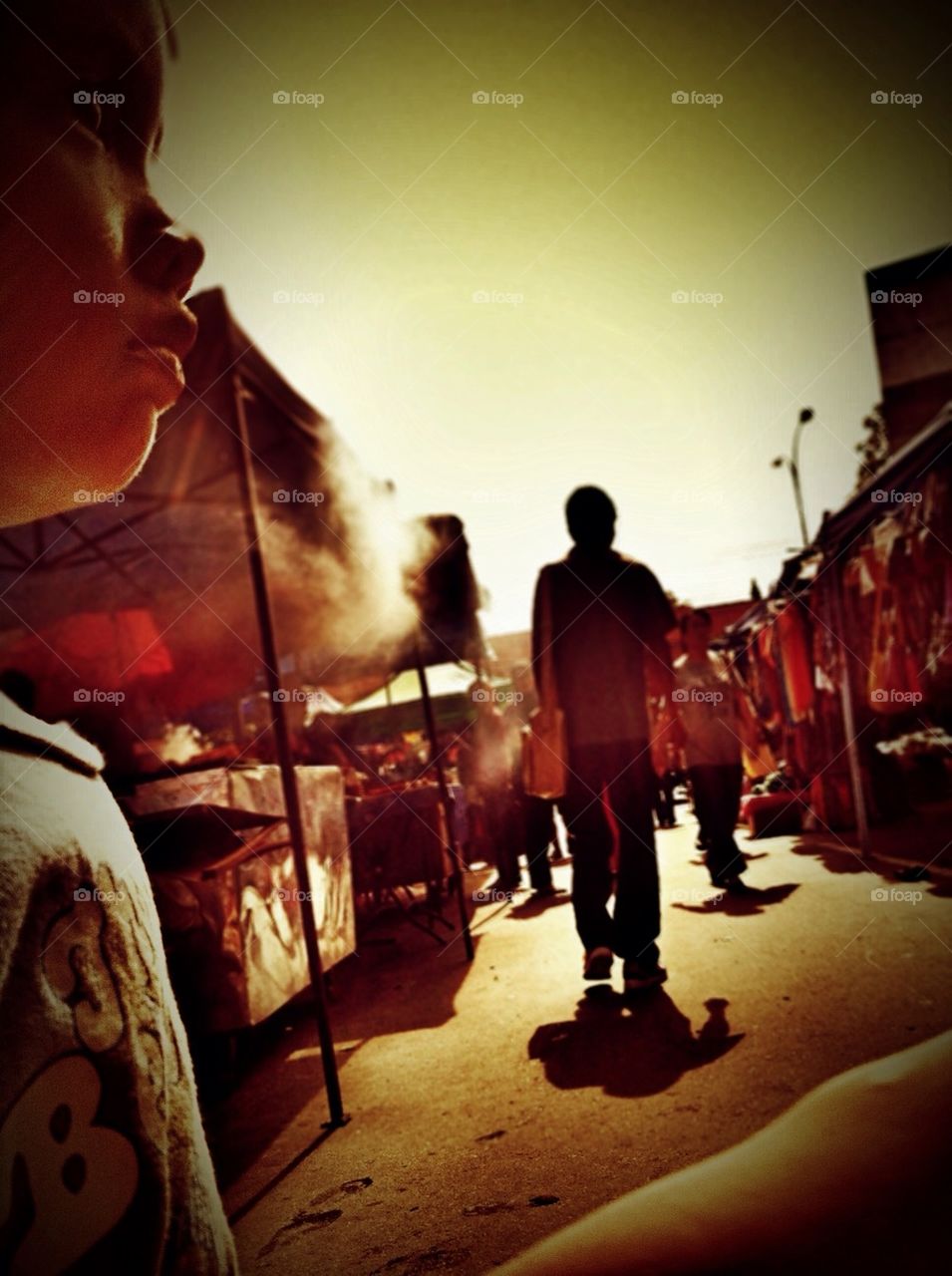 Man walking in a flea market