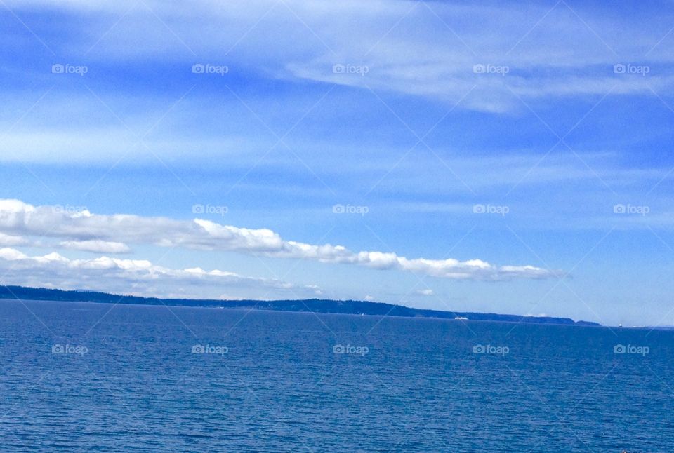 Spring on the Sound. Partially cloudy, a ferry in the distance, landscape, Puget Sound