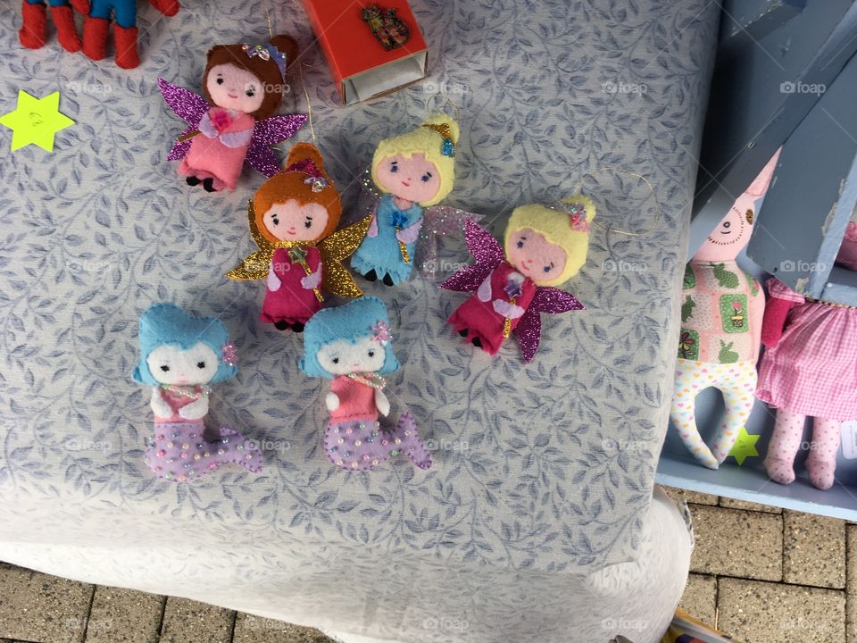 Beautiful handmade dolls for sale in a market 