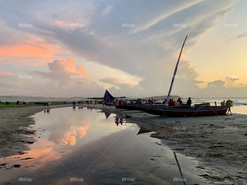 Waterfront with fisher boat on the beach 