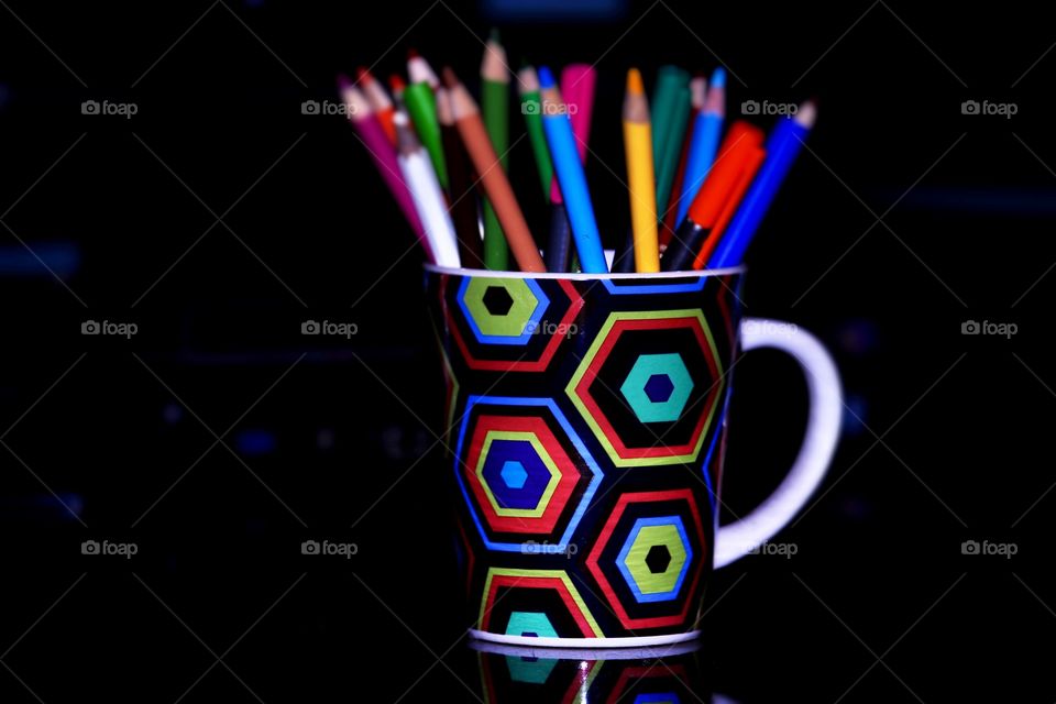 Color pencils in a cup