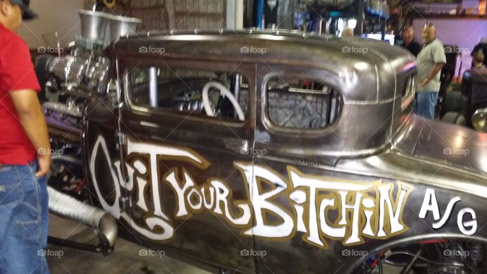 art on a old vehicle Las Vegas white writing