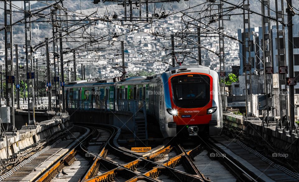 Mumbai metro with a backdrop of the city that never sleeps