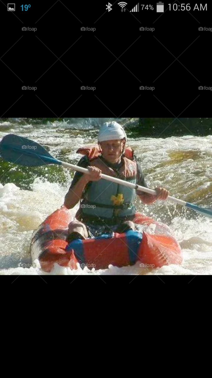 Having Fun. my son on the rapids 