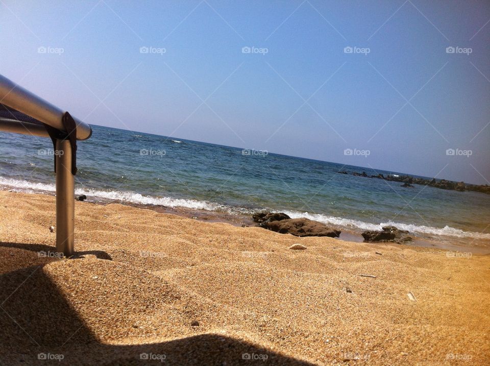 Relaxing at the beach. Sand sun sea summer Greece MTR 