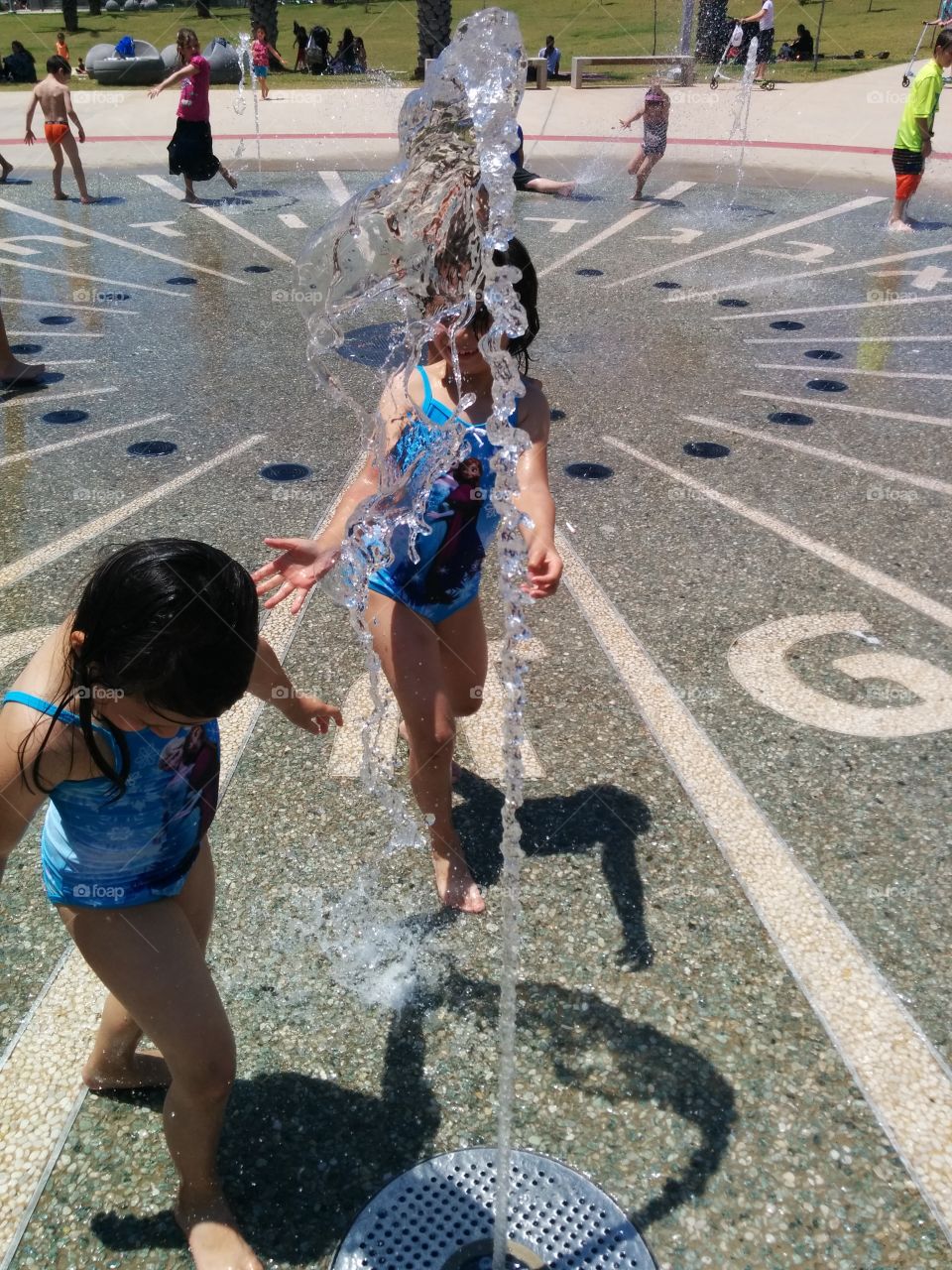 Stop the time. Children playing with water