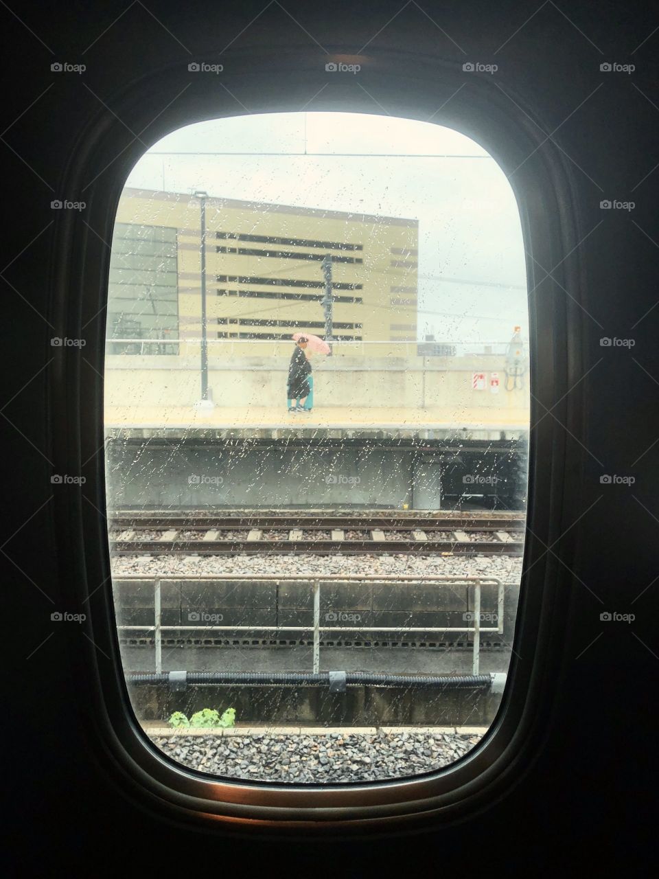 A Train Window In The Rain