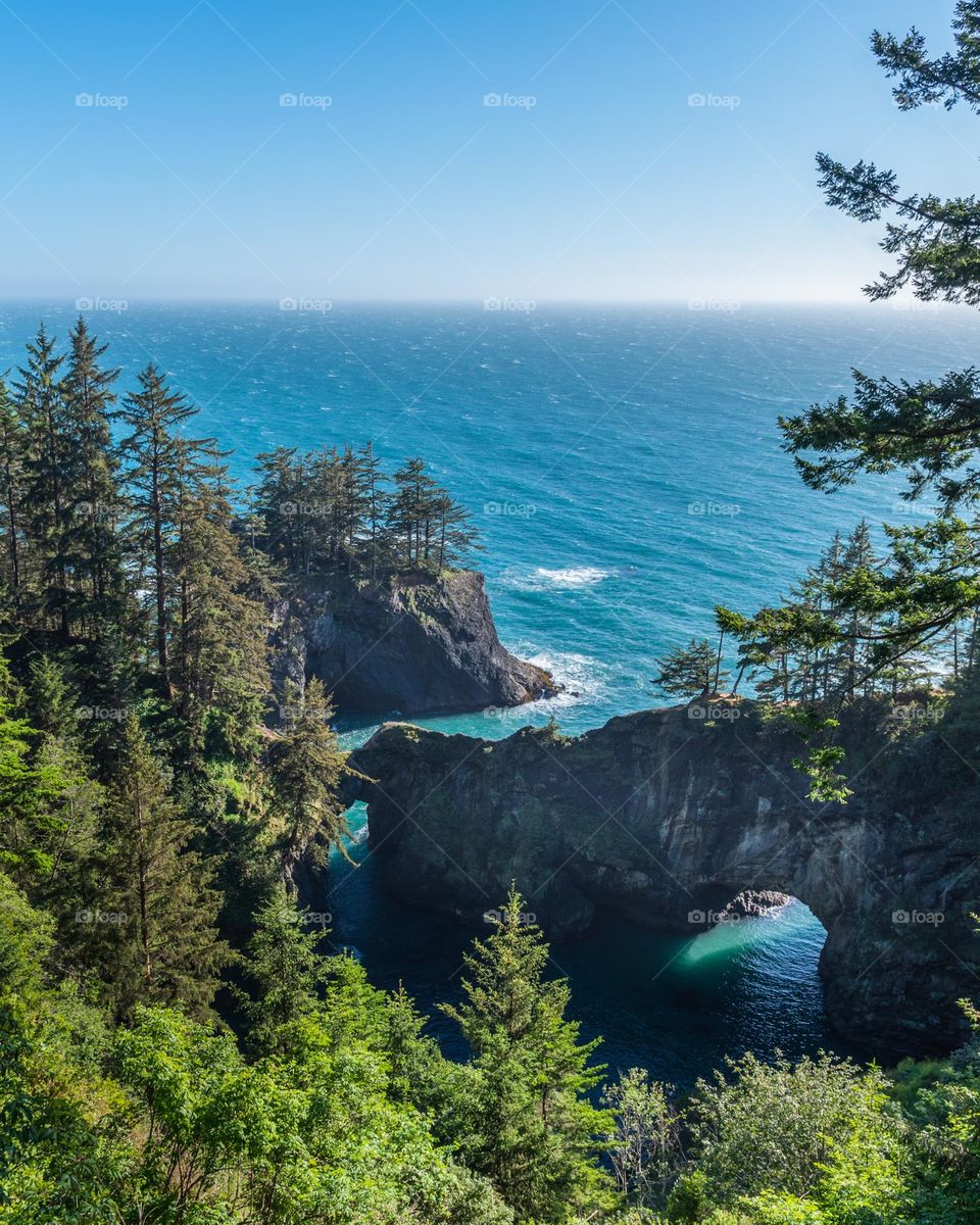 The wild and beautiful Oregon Coast seascape on a sunny blue sky afternoon 