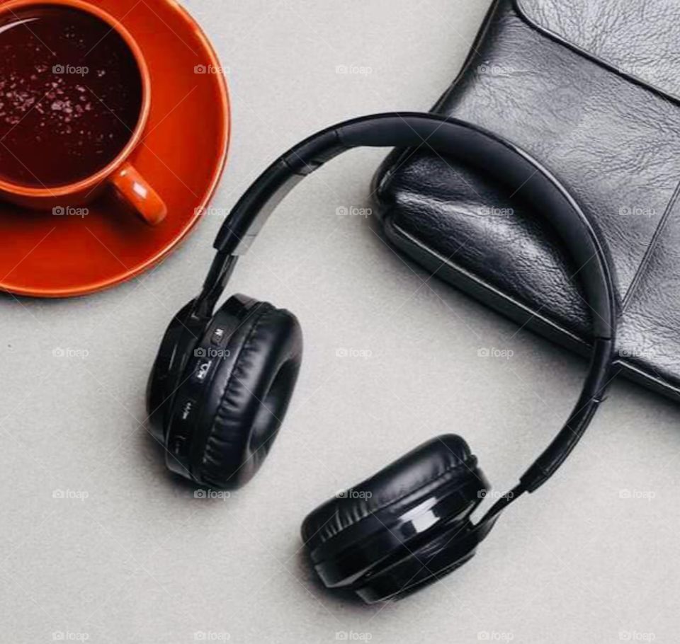 Color: Red, colourful coffee with black and white earphone and wallet. Flat lay out.