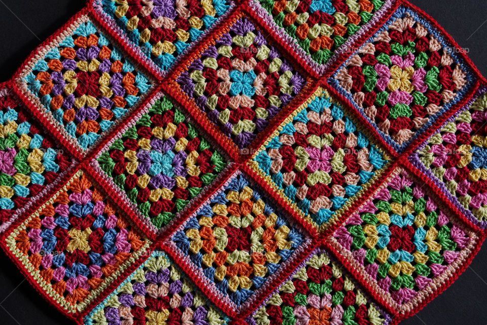 Hand made crocheted colored granny squares