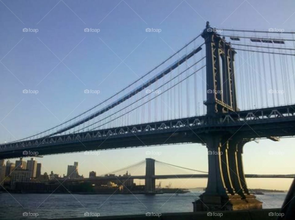 The Manhattan and Brooklyn Bridges, next to each other standing tall! This picture helped me gain my first art gallery spot.