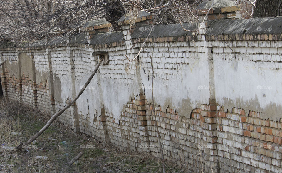old falling brick wall,  grunge style.  rectangles form in daily life concept