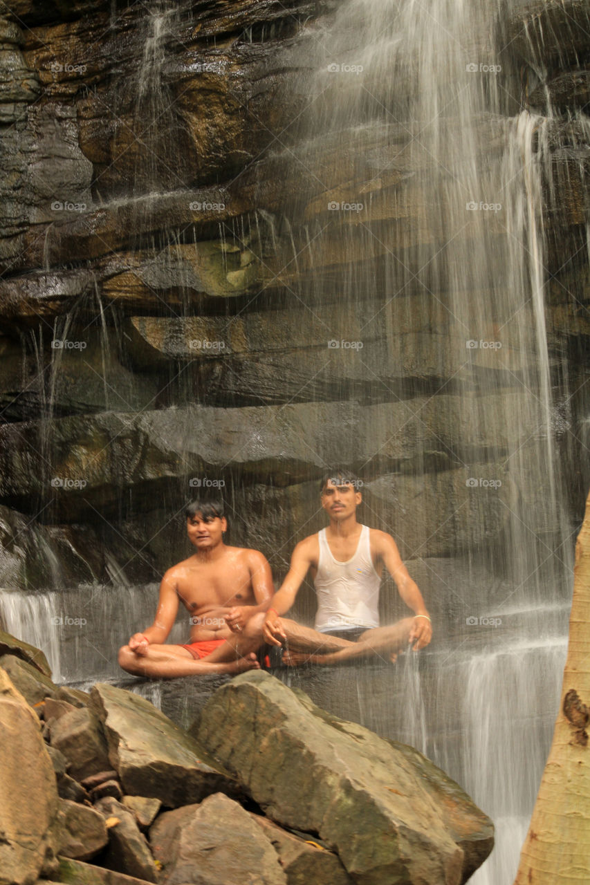 Relaxing under the waterfall