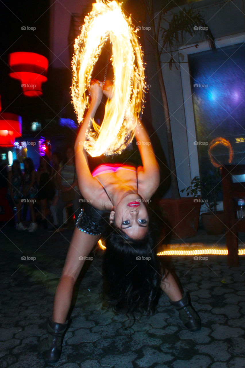 Joy, the fire dancer doing her fearless acts