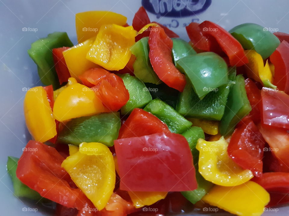red pepper, yellow pepper and green pepper salad