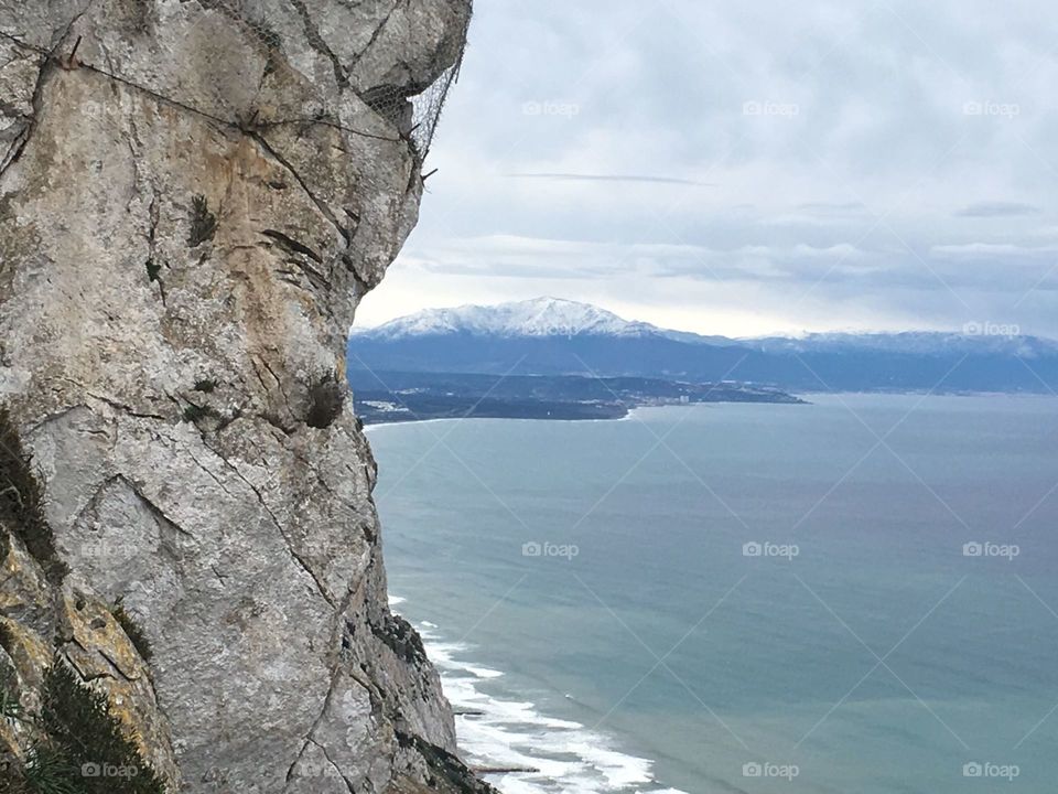 Tips of mountains covered in snow 