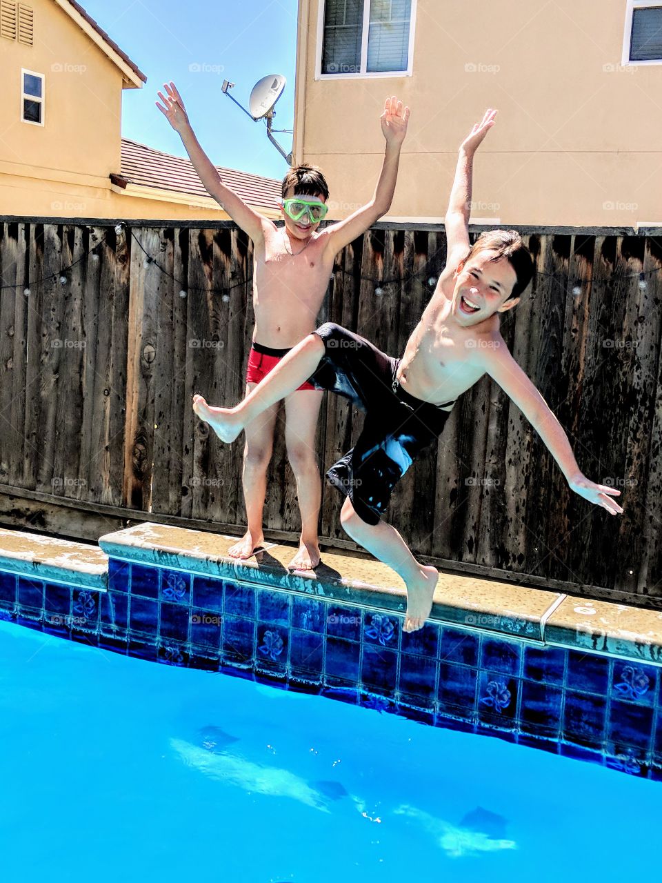 Out of school, into pool, goggles on, let's have some fun.