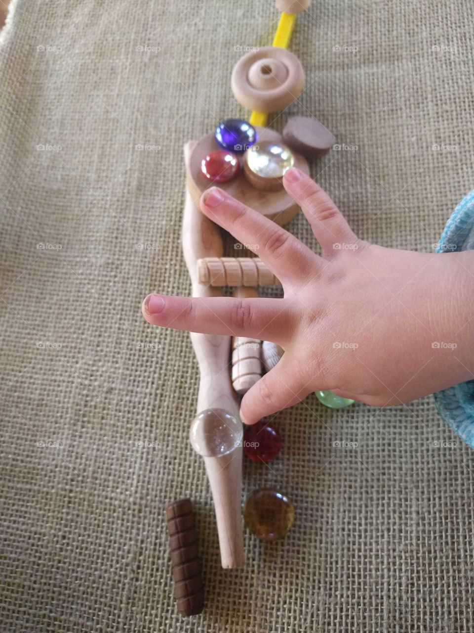 A small child practices counting