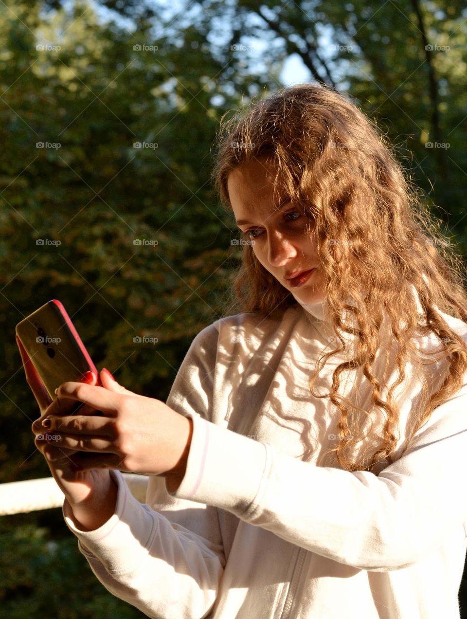 selfie girl beautiful portrait in sunlight and shadows summer time