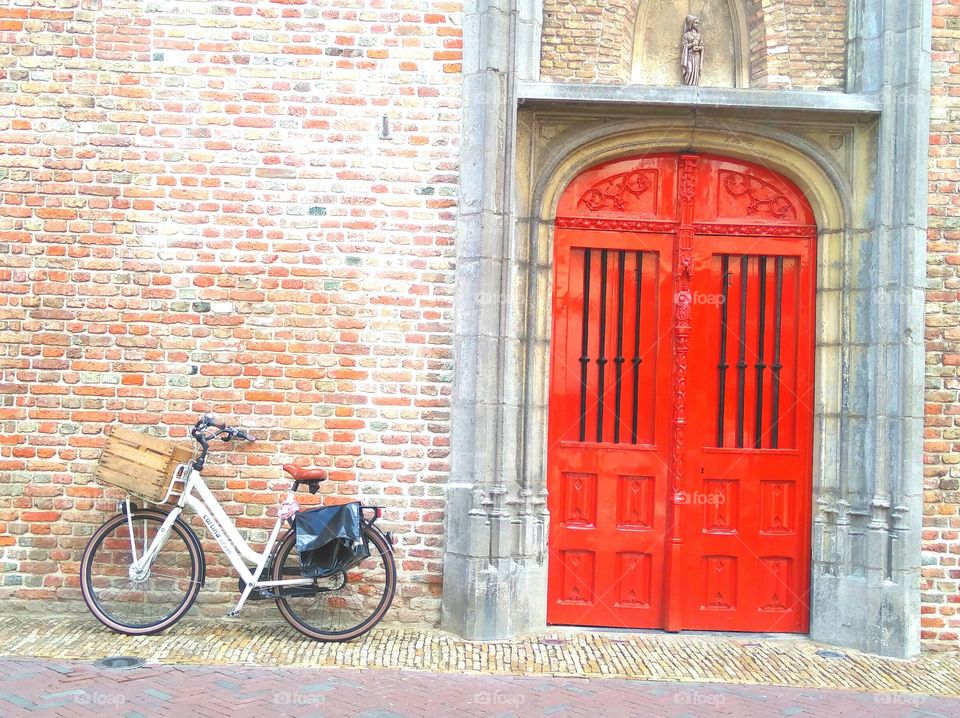 red door with bicycle