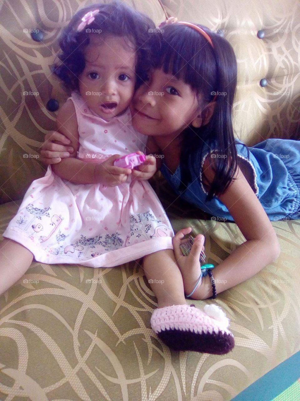 My daughters Mary and Sheikha having fun at home.

