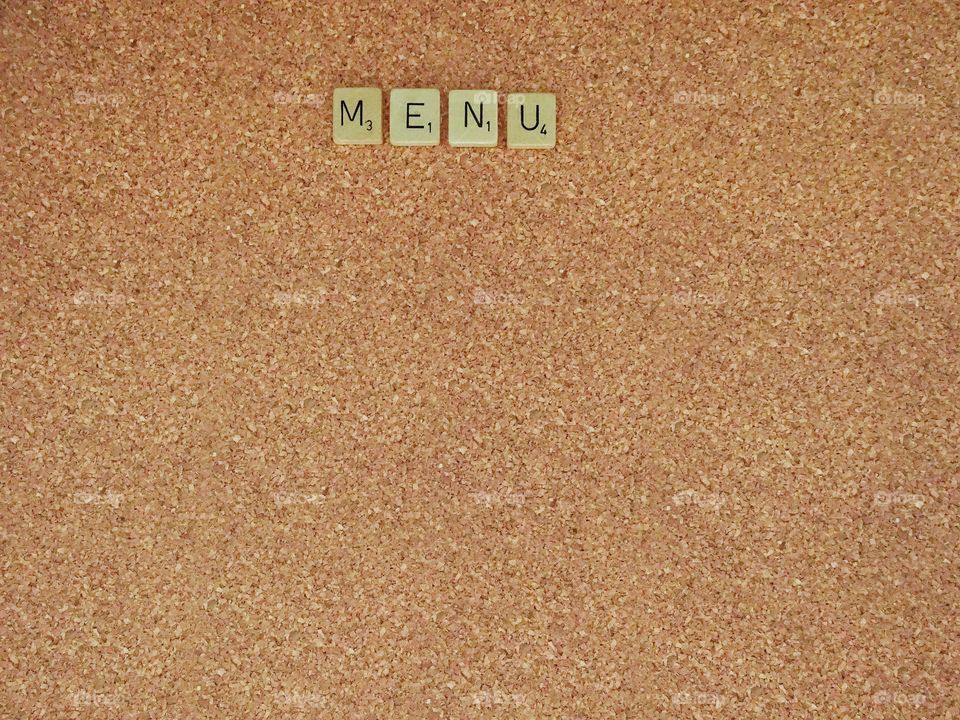 Word on corkboard background