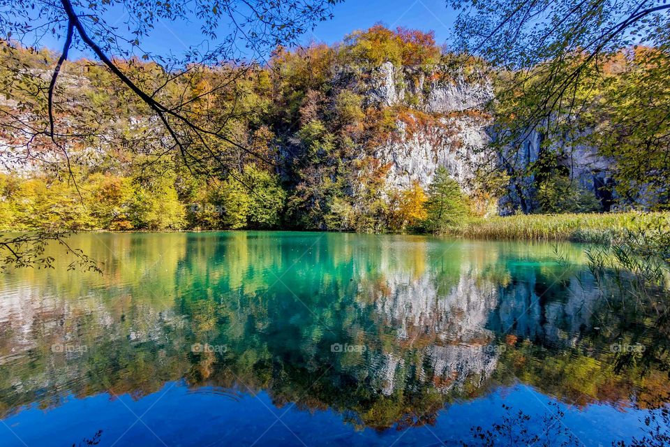 Scenic view of lake against mountain at plitvice lakes national park