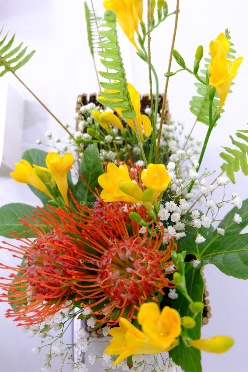 Floral arrangement, red, yellow and white flowers