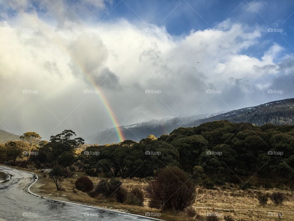 Snowy mountains rainbow after the rain 🌧🌈❄️