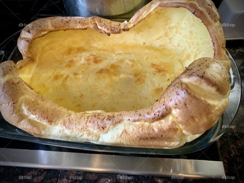German pancakes made for breakfast in a glass baking pan in the kitchen at home. USA, America 